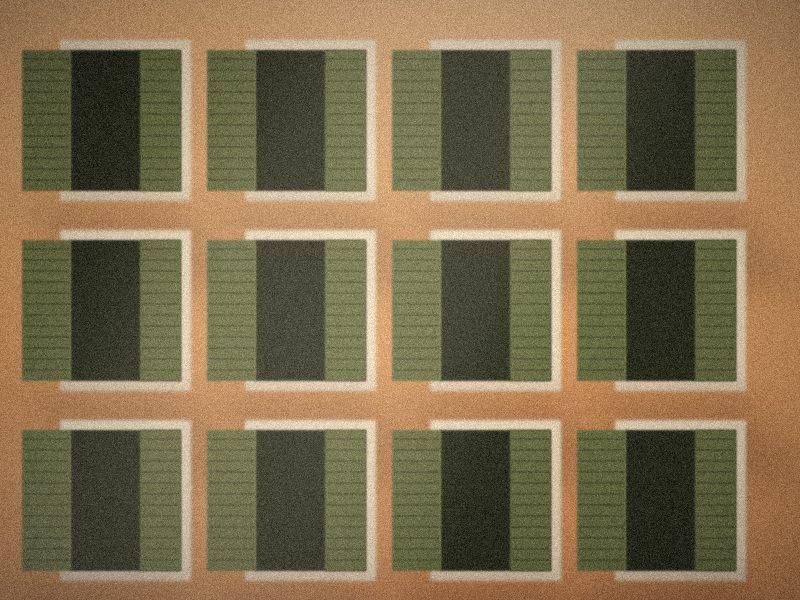 Façade niçoise ocre aux volets verts entrouverts